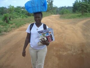 Aminata carrying the radios